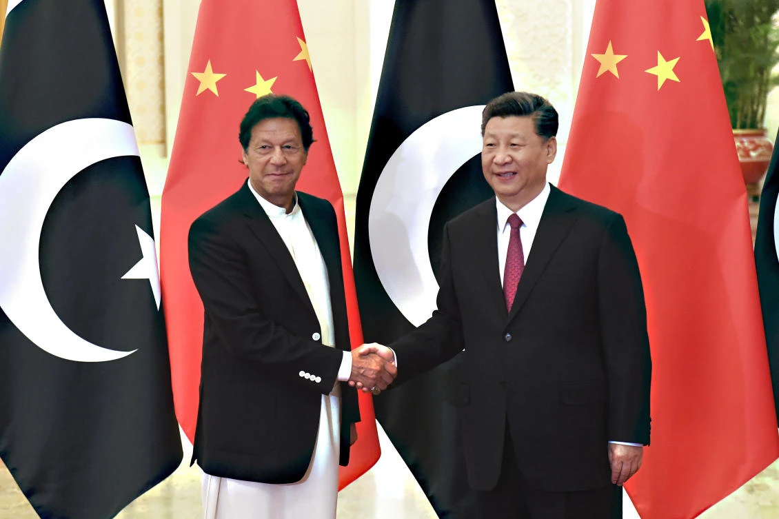 FILE - In this April 28, 2019, file photo, China's President Xi Jinping, right, shakes hands with Pakistan's Prime Minister Imran Khan before a meeting at the Great Hall of the People in Beijing. (AP)