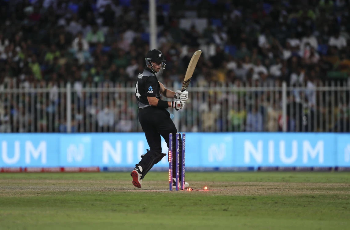 New Zealand’s Mitchell Santner is bowled out by Pakistan’s Haris Rauf during the Cricket Twenty20 World Cup match between New Zealand and Pakistan in Sharjah, UAE, Tuesday, Oct. 26, 2021. (AP/Aijaz Rahi)