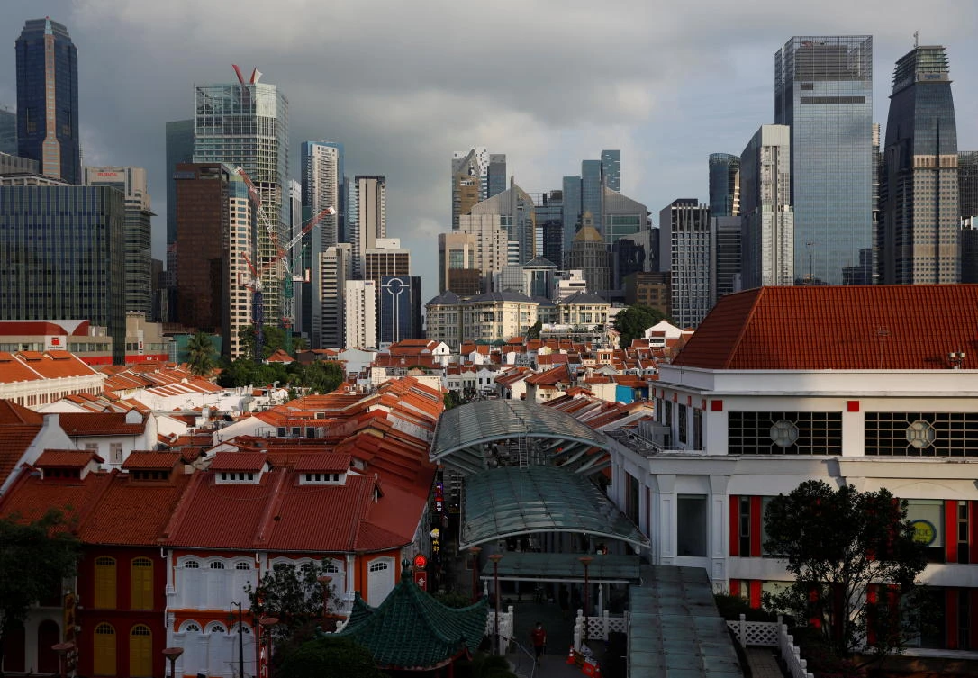 Singapore authorities reinstated curbs limiting social interactions and dining out to two people, so as to slow infections. (Reuters)