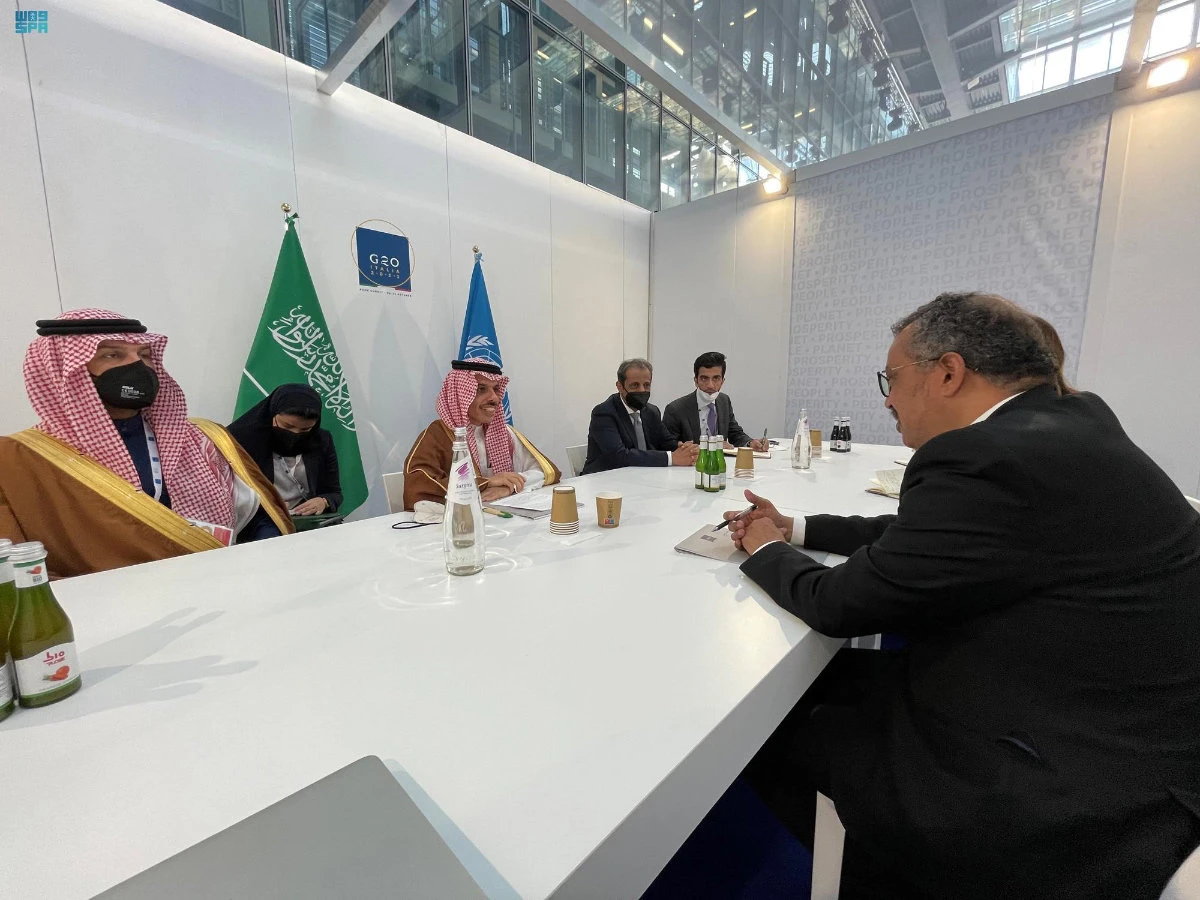 Saudi FM Prince Faisal bin Farhan (mid-left) and his delegation meet met the director general of the World Health Organization, Tedros Adhanom Ghebreyesus
