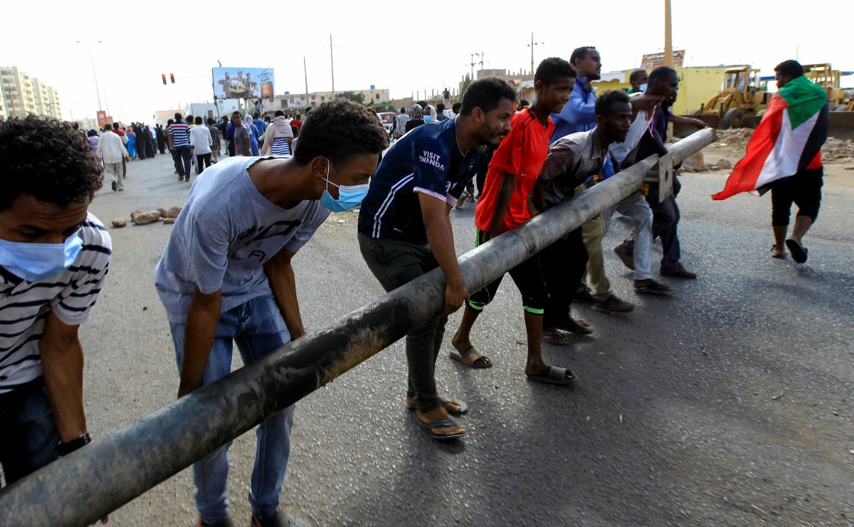 Tens of thousands protest Sudan’s coup, 3 protesters killed
