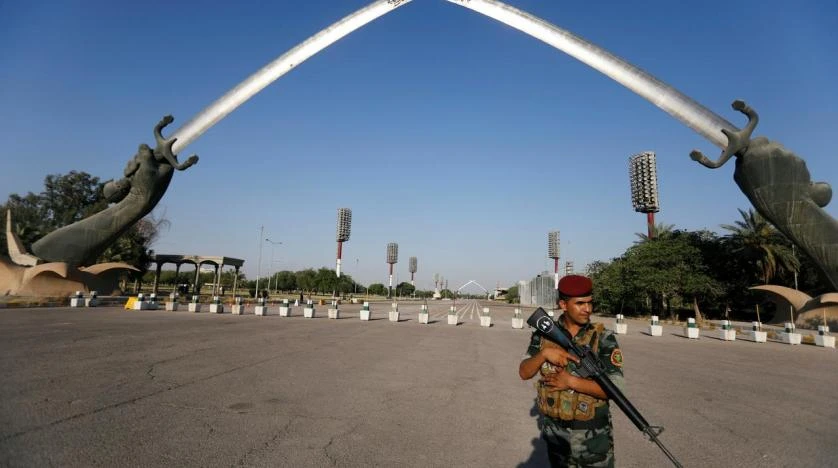 An Iraqi security officer stands guard next to the "Arch of Victory" memorial in the Green Zone of Baghdad, Iraq June 24, 2019. (Reuters)