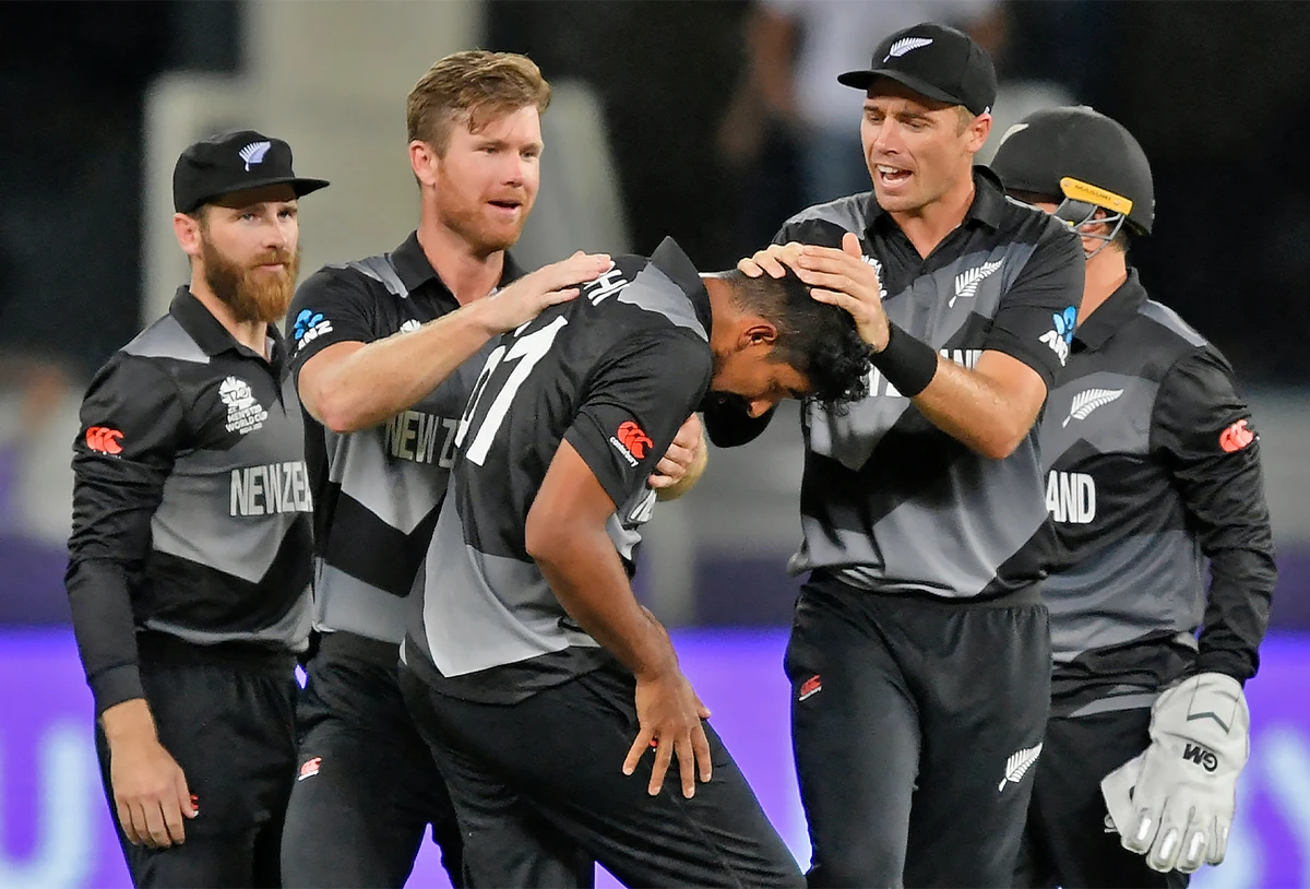 New Zealand's players celebrate after the dismissal of India's captain Virat Kohli (not pictured) during the ICC mens Twenty20 World Cup cricket match between India and New Zealand in Dubai, UAE, on October 31, 2021. (AFP)
