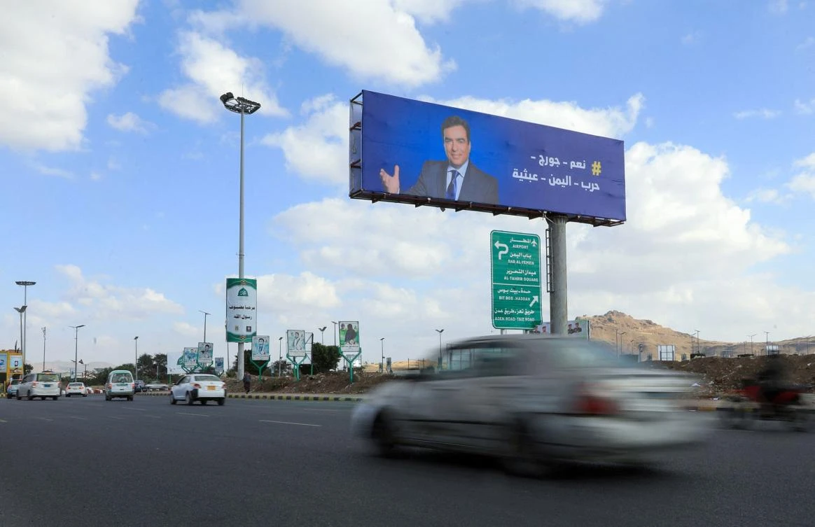 Houthi militia put up posters backing Lebanese minister, George Kordahi