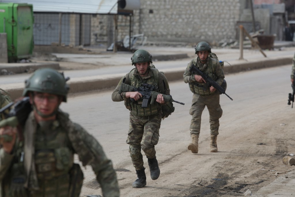Turkish troops patrol in the town of Atareb in Aleppo province in 2020. (AFP/File)