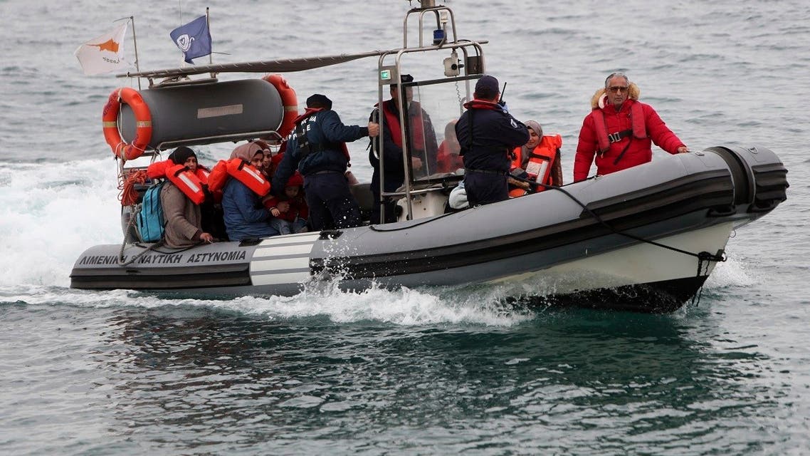Migrants on a Cyprus Port & Marine Police patrol boat after being rescued off the island’s southeastern coast, Protaras, Cyprus, Jan. 14, 2020. (AP Photo)