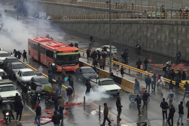 Iranians protest against an increase in gas prices, Tehran, Iran, Nov. 16, 2019. (Reuters)