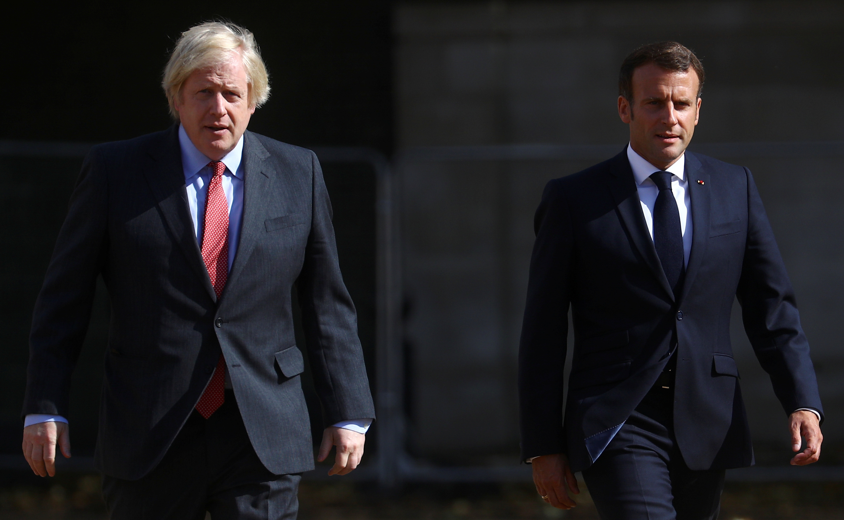 Boris Johnson and Emmanuel Macron at Horse Guards Parade in London, Britain, June 18, 2020. (Reuters)