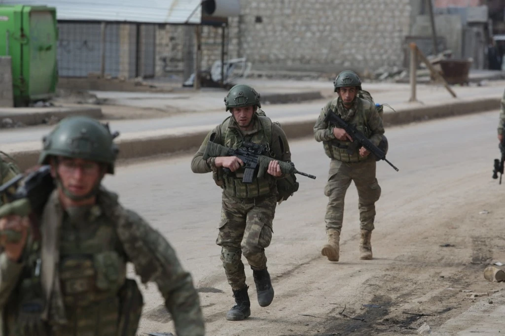 Turkish troops patrol in the town of Atareb in Aleppo province in 2020. (AFP/File)