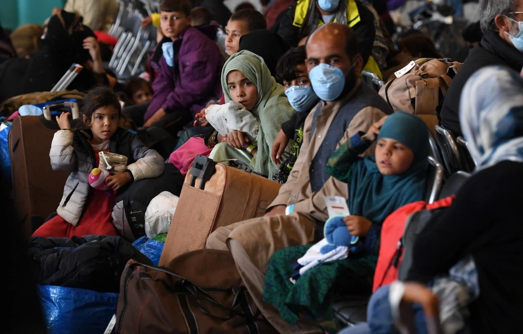 Afghan refugees inside Hangar 5 at Ramstein Air Base, Germany, Sept. 2021. (AFP)