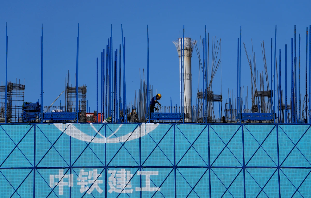 China's economy slows as Beijing wrestles with debt