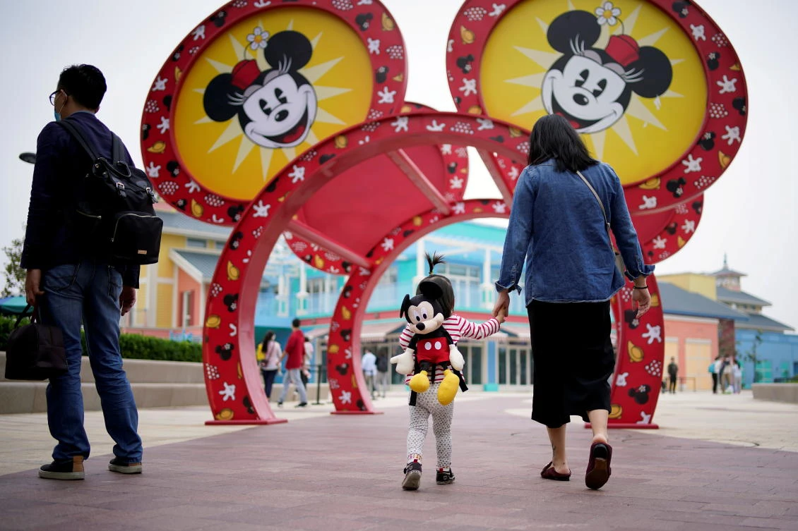 Visitors are seen at Shanghai Disney Resort a day before the Shanghai Disneyland theme park reopens following a shutdown due to the coronavirus disease (COVID-19) outbreak, in Shanghai, China May 10, 2020. (Reuters)