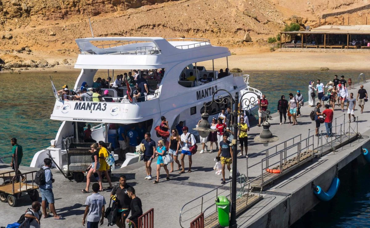 The Egyptian government has kept looser virus-related restrictions in the Red Sea resorts of Hurghada and Sharm El-Sheikh to try to attract foreign visitors. (AFP)