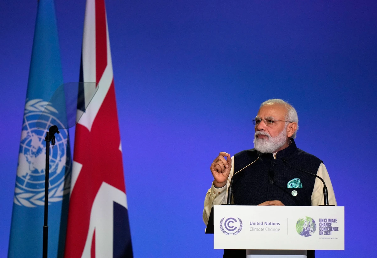 India's Prime Minister Narendra Modi presents his national statement as part of the World Leaders' Summit of the COP26 UN Climate Change Conference in Glasgow, Scotland on Nov. 1, 2021. (AFP)