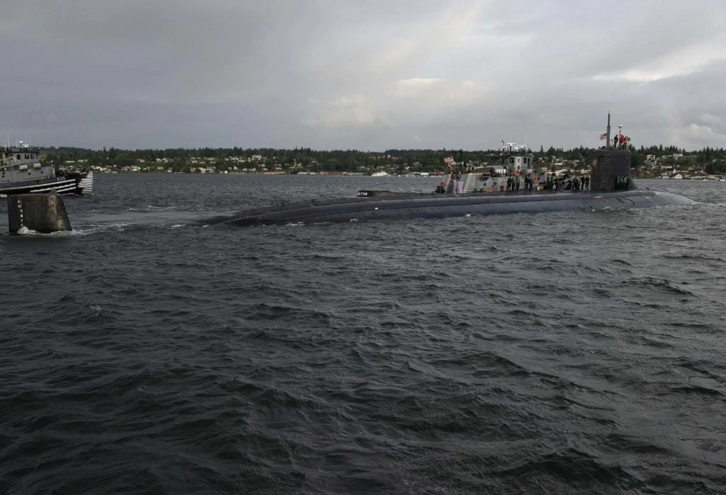 Above, the USS Connecticut departs Naval Base Kitsap-Bremerton for deployment on May 27, 2021. (US Navy via AFP)