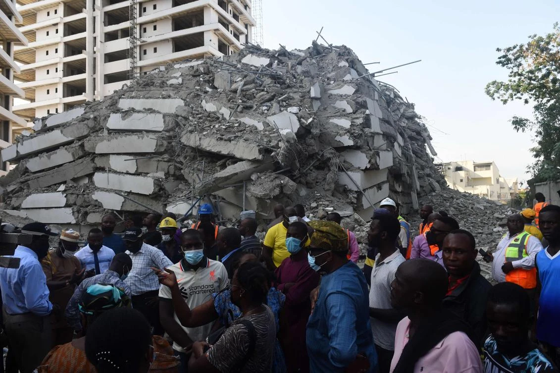 Workers fear dozens of their colleagues are trapped inside 21-story building that was still under construction. (AFP)
