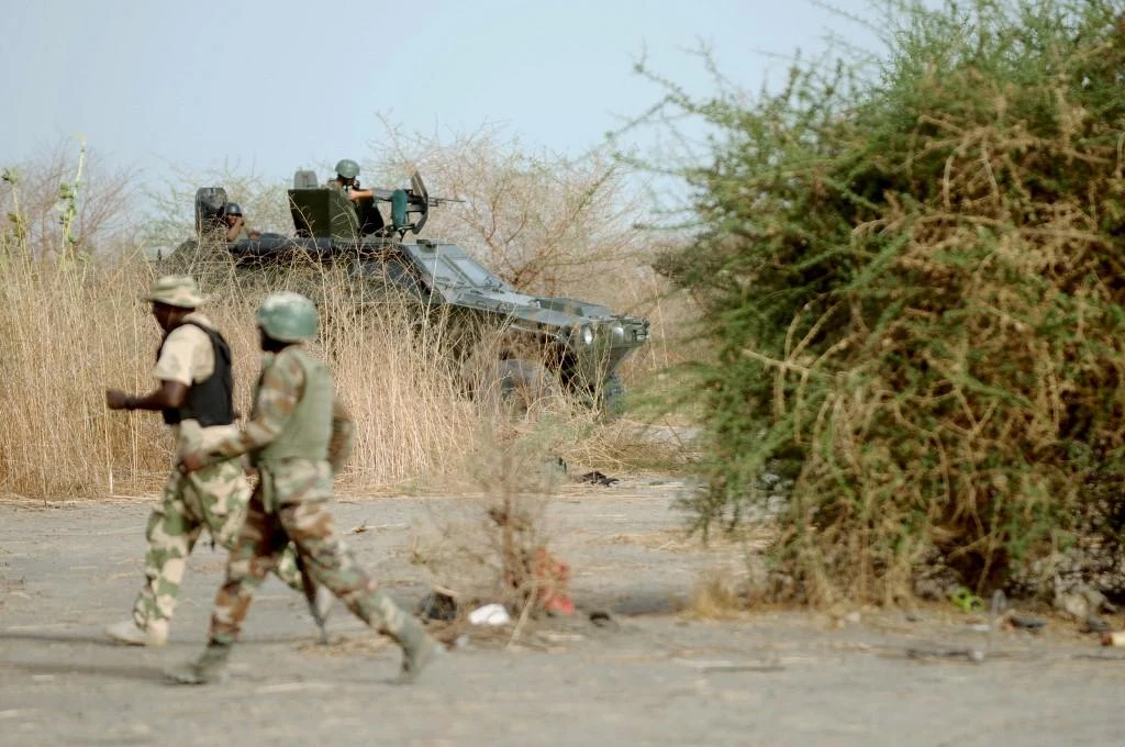 Daesh-aligned militants had warned farmers from burning shrubs and thicket in the area which give them cover from Nigerian troops. (AFP)
