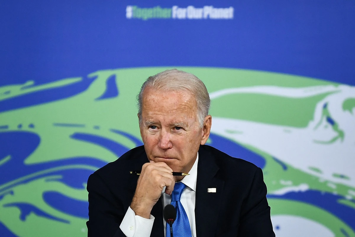 Joe Biden reacts during a meeting on "the Build Back Better World (B3W)", as part of the World Leaders' Summit of the COP26 UN Climate Change Conference in Glasgow. (AFP)
