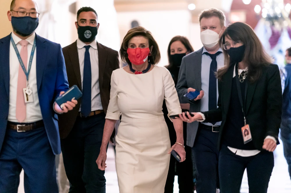 House Speaker Nancy Pelosi worked furiously into the night at the Capitol Thursday and kept the House late to shore up votes