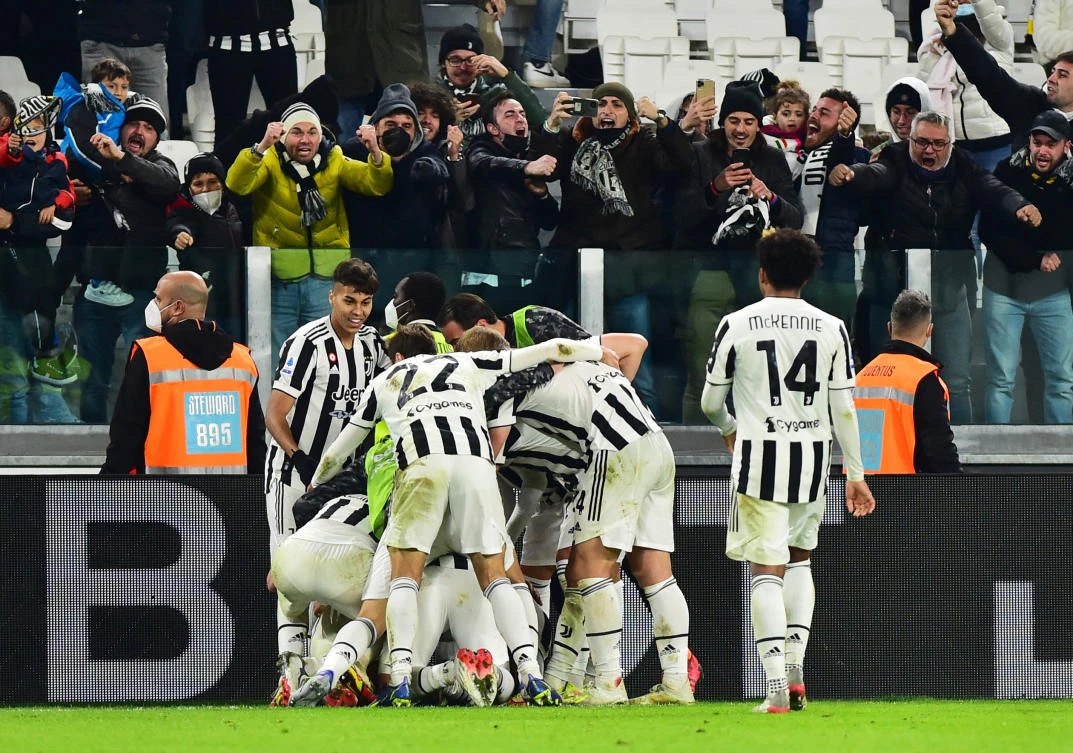 Juventus’ Juan Cuadrado celebrates scoring their first goal with teammates in their Serie A match against Fiorentina at Allianz Stadium, Turin on Saturday. (Reuters)