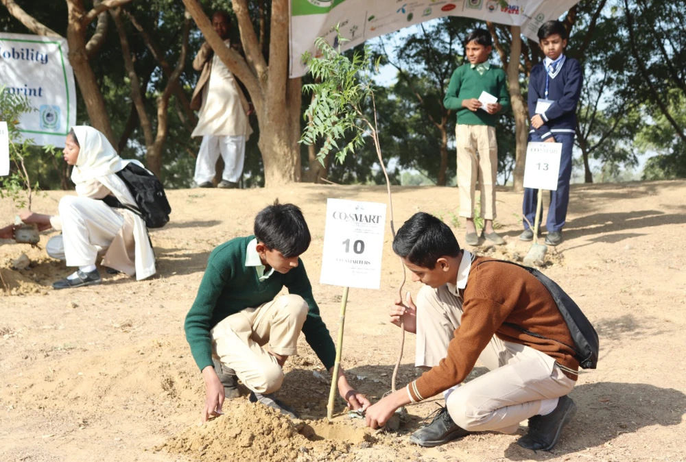 Students plant trees at Ansari Green Park in Tharparkar, Sindh province, Pakistan in April 2019. (NED University)