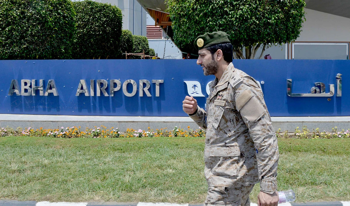 This file photo taken taken during a guided tour with the Saudi military on June 13, 2019 shows the welcoming sign at Abha Airport in the popular mountain resort of the same name in the southwest of Saudi Arabia. (AFP)