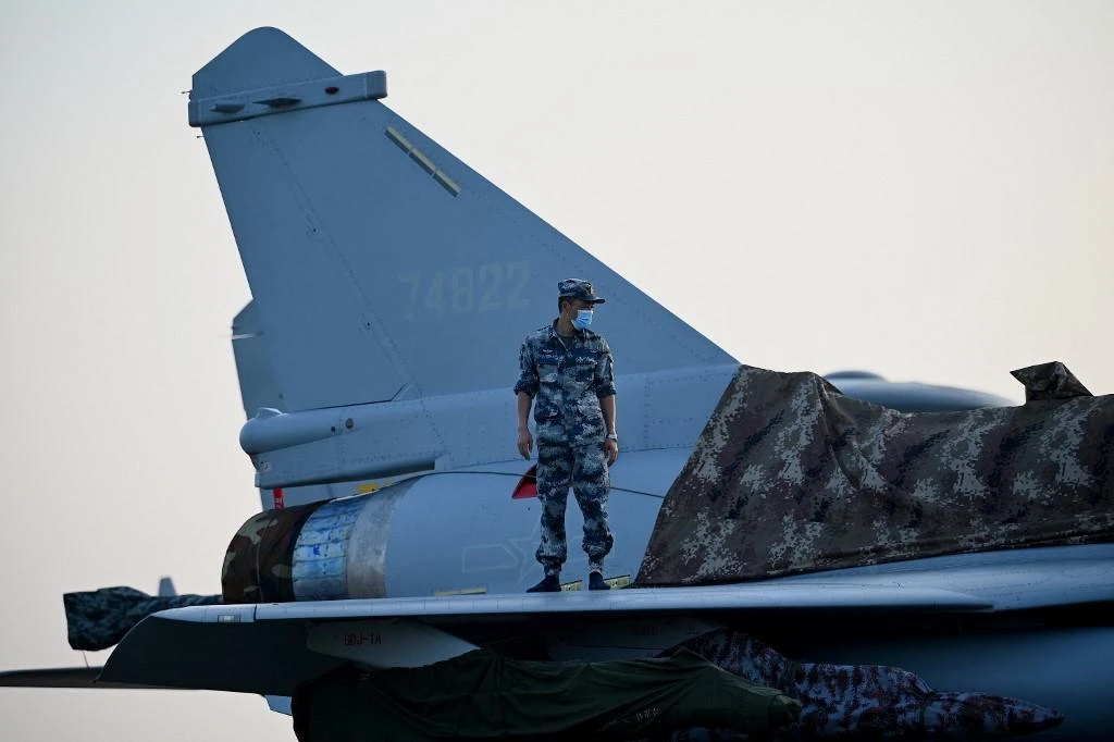 During China’s National Day weekend in early October, China dispatched 149 military aircraft southwest of Taiwan in strike group formations, causing Taiwan to scramble aircraft and activate its air defense missile systems. (AFP)