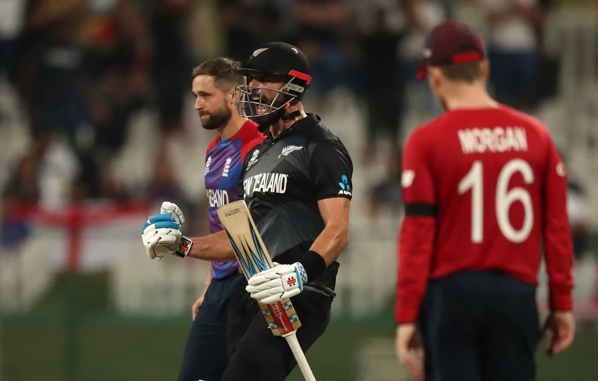 New Zealand's batsman Daryl Mitchell celebrates after winning the Cricket Twenty20 World Cup semi-final match against England in Abu Dhabi. (AP)