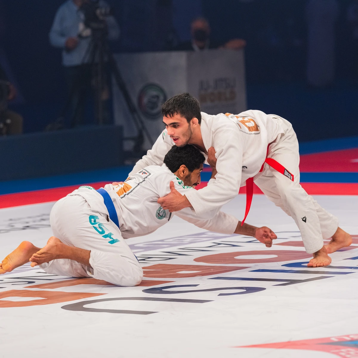 Saudi's Abdulmalik Al-Murdhi and the UAE's Omar Al-Fadhli in their male -62kg contest. (JJWC)