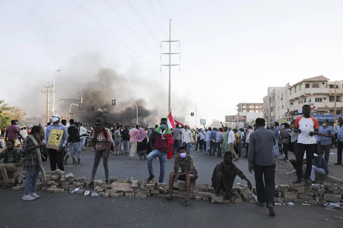 People protest in Khartoum, Sudan, Saturday, Nov. 13, 2021. (AP Photo/Marwan Ali)