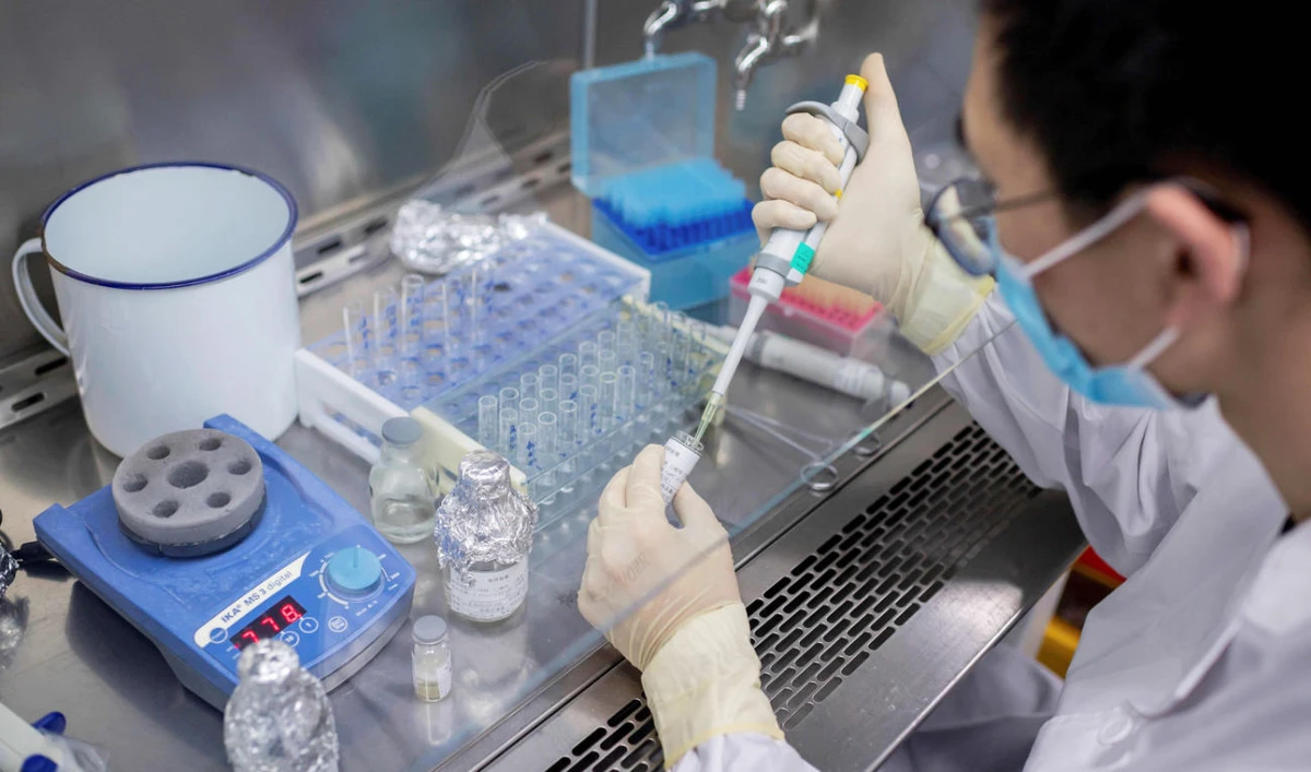 This file photo taken on April 29, 2020 shows an engineer working at the Quality Control Laboratory on an experimental vaccine for the COVID-19 coronavirus at the Sinovac Biotech facilities in Beijing. (AFP)