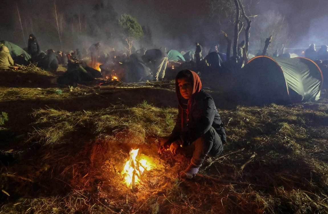 Thousands of migrants, mainly from the Middle East, are camped out or staying close to the Poland-Belarus border in dire conditions aiming to cross into the European Union. (File/AFP)