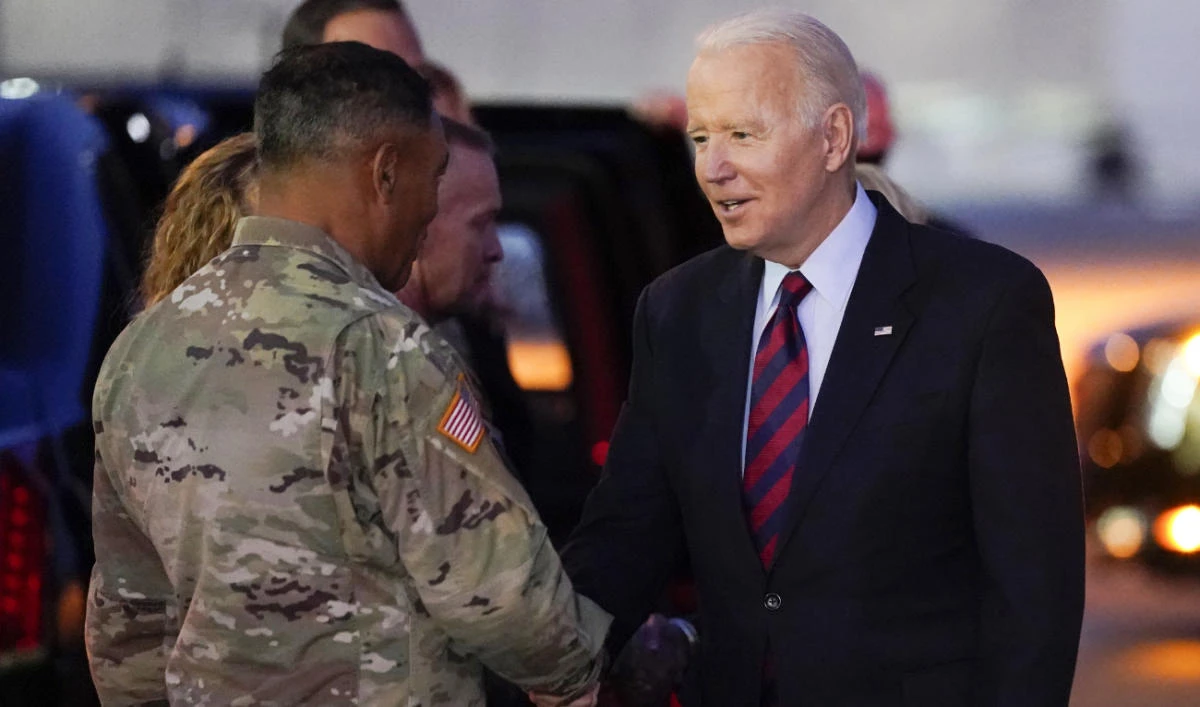 President Joe Biden greets soldiers as he arrives at Fort Bragg on Air Force One to mark the upcoming Thanksgiving holiday, Monday, Nov. 22, 2021, in Fort Bragg, N.C. (AP)
