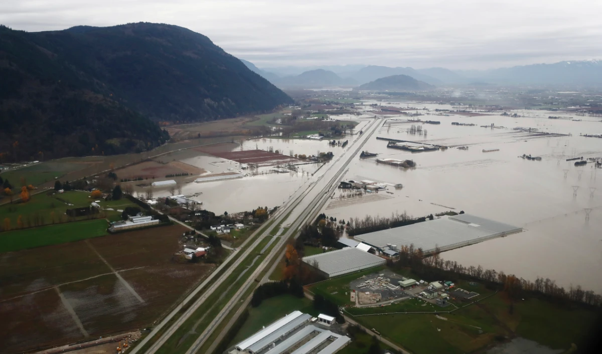 Flooded farms are seen along the Trans-Canada Highway in this aerial photo in Abbotsford, British Columbia., on Monday, Nov. 22, 2021. (AP)