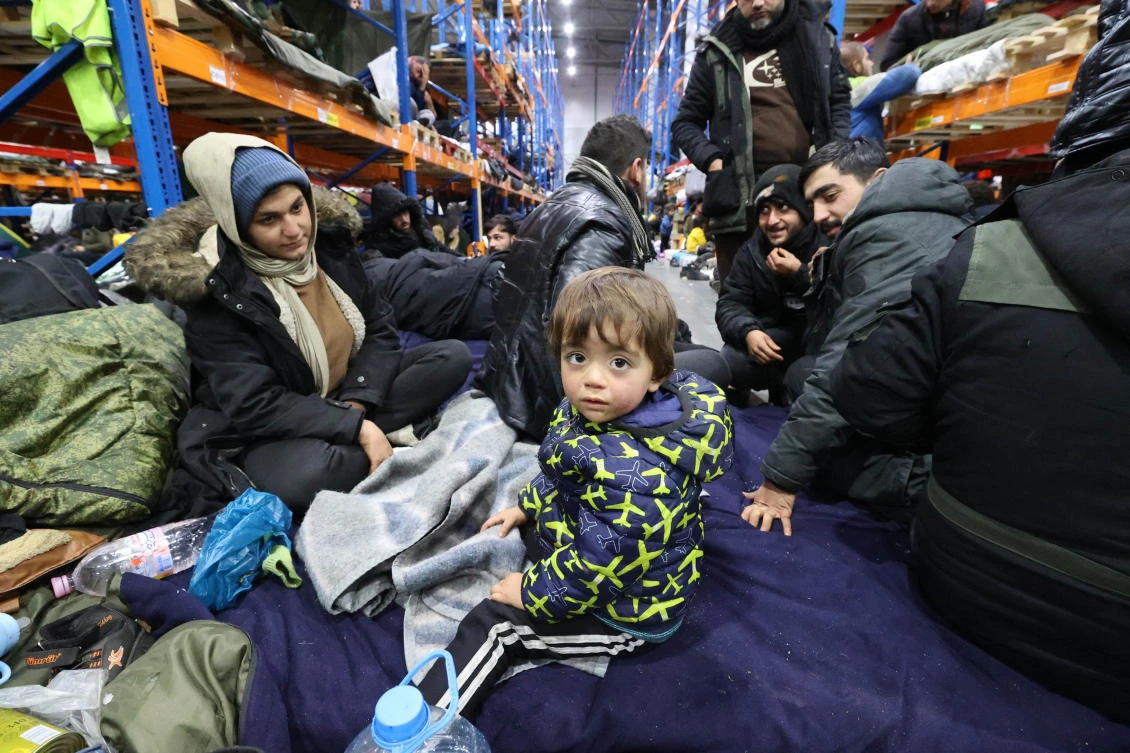 The European Union accuses Belarus of flying in thousands of people from the Middle East and pushing them to cross into the bloc via Poland, Lithuania and Latvia. (File/AFP)