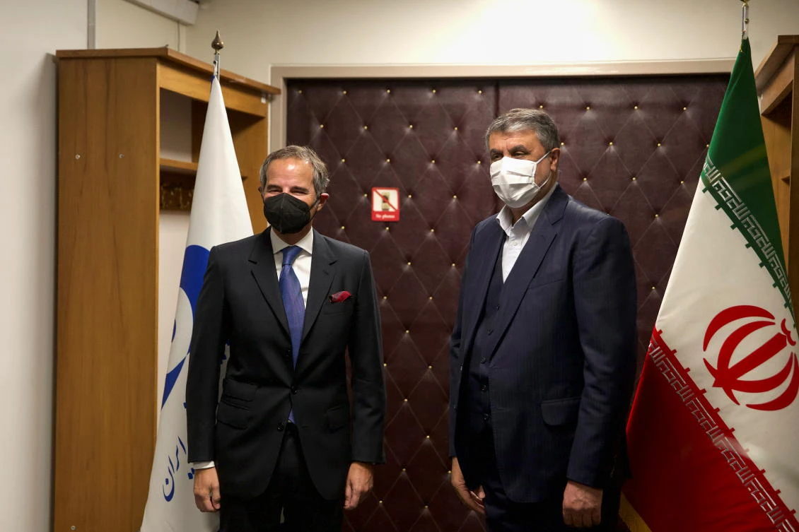 IAEA Director General Rafael Grossi meets with head of Iran's Atomic Energy Organization Mohammad Eslami, in Tehran, Iran, November 23, 2021. (ISNA/WANA via Reuters)
