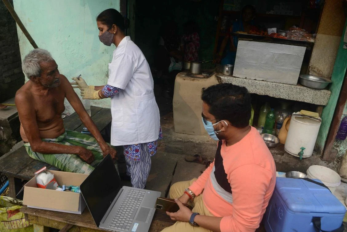 India has so far administered 1.18 billion vaccine doses, at least one dose in 82 percent of its 944 million adults and two in 44 percent. (AFP)