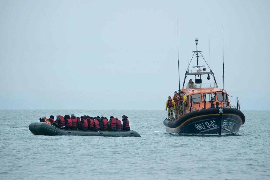 France’s interior minister said 4 suspected traffickers were arrested Wednesday on suspicion of being linked to a deadly migrant boat sinking in the English Channel that killed at least 31 people. (AFP)