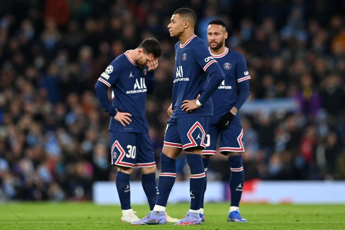 Paris Saint-Germain’s Argentinian striker Lionel Messi (L), French striker Kylian Mbappe (C) and Brazilian striker Neymar (R) react after City equalize during the UEFA Champions League Group match between City and Paris Saint-Germain. (AFP)