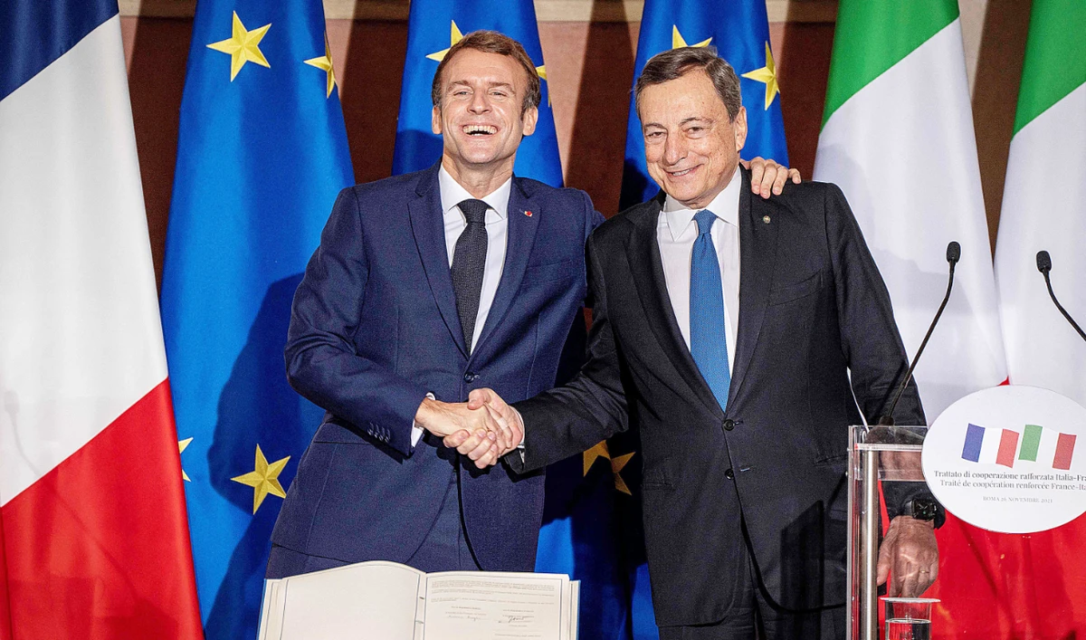 French President Emmanuel Macron, left, and Italian Prime Minister Mario Draghi during a joint press conference. AFP after signing the Quirinal Treaty. (AFP)