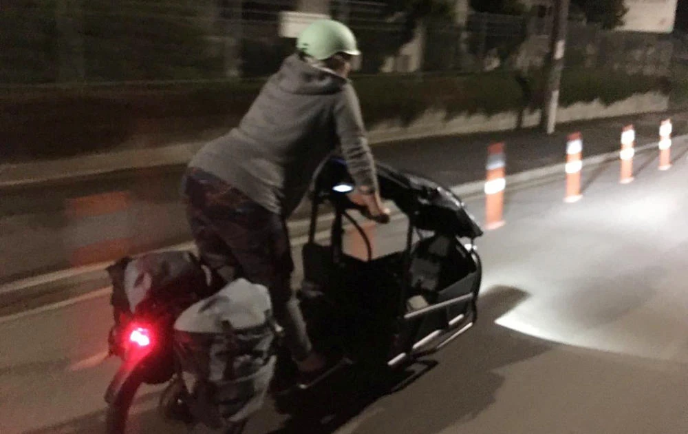 Green Party MP Julie Anne Genter rides a bicyle to the hospital while in labour, in Wellington, New Zealand, November 28, 2021, in this picture obtained from social media. (REUTERS)