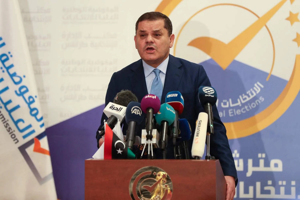 Libya's interim PM Abdulhamid Dbeibah speaks after registering his candidacy for next month's presidential election on November 21, 2021 in Tripoli. (AFP)