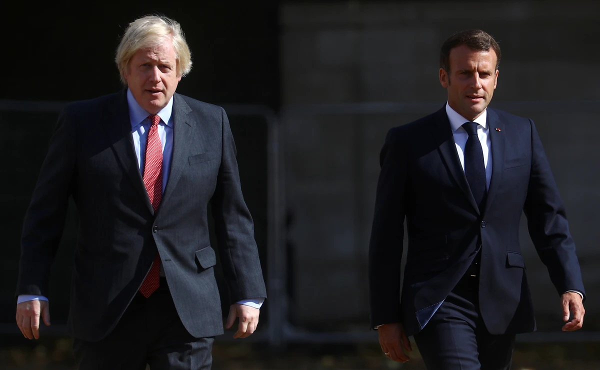Boris Johnson and Emmanuel Macron at Horse Guards Parade in London, Britain, June 18, 2020. (Reuters)