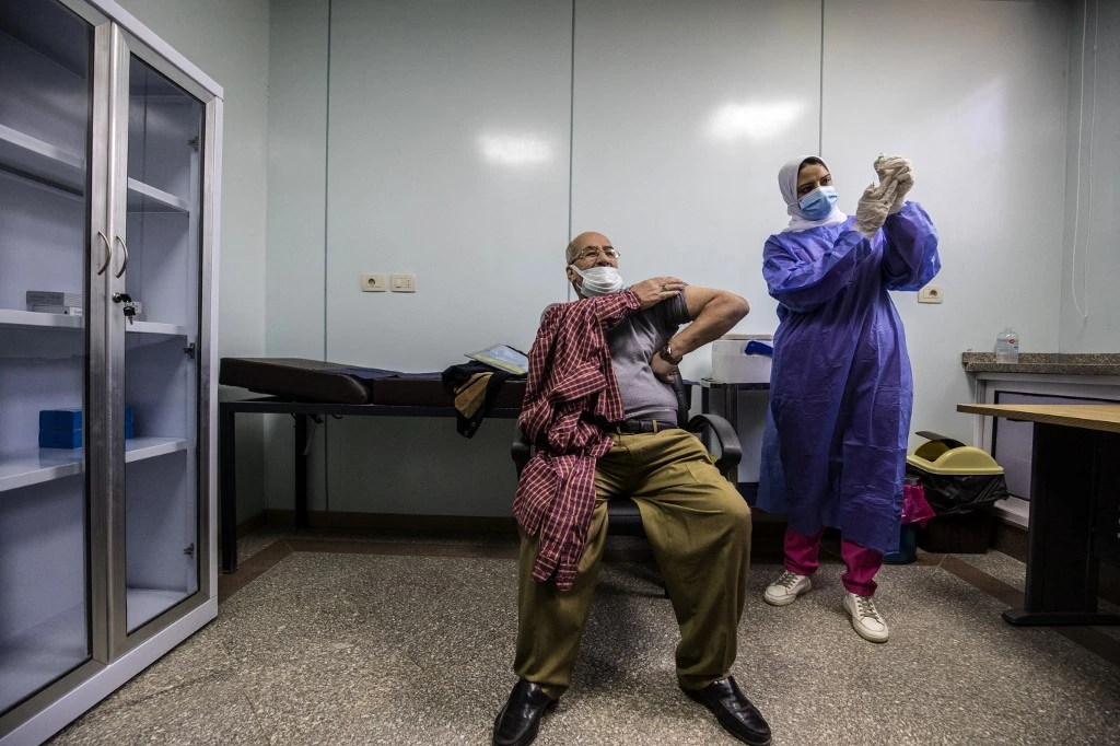 Unvaccinated Egyptians will be denied access to government services and buildings unless they can provide a negative PCR test. (File/AFP)