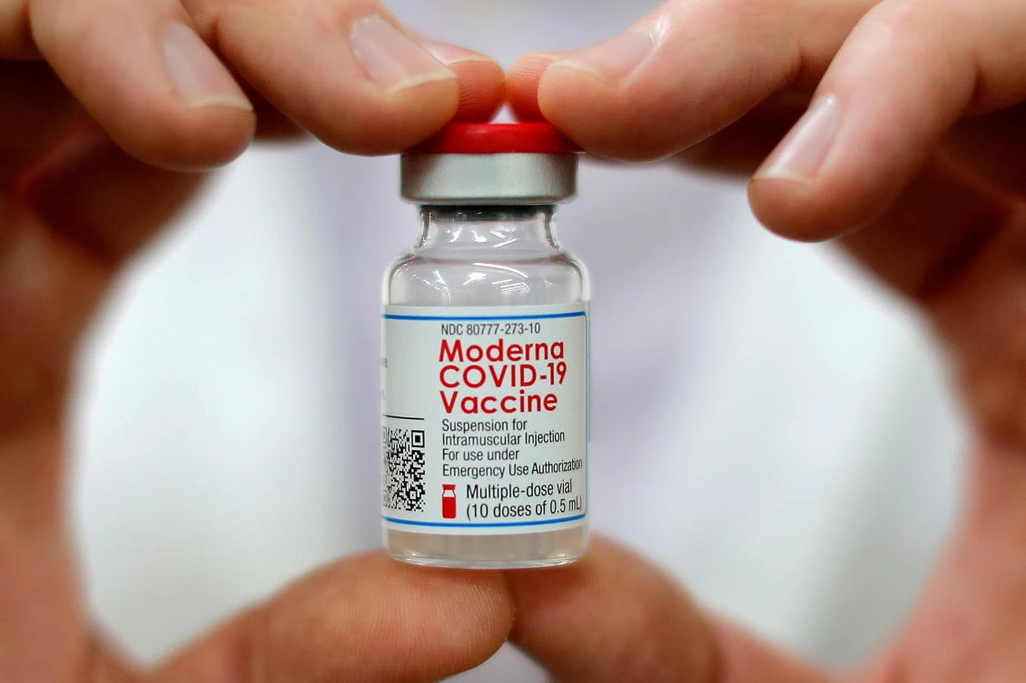 FILE PHOTO: Moderna Inc. could have a COVID-19 booster shot targeting the Omicron variant tested and ready to file for US authorization by March, the company’s president said Wednesday. (Reuters)