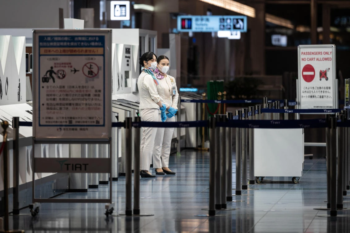 Japan retracts new flight bookings ban after criticisms
