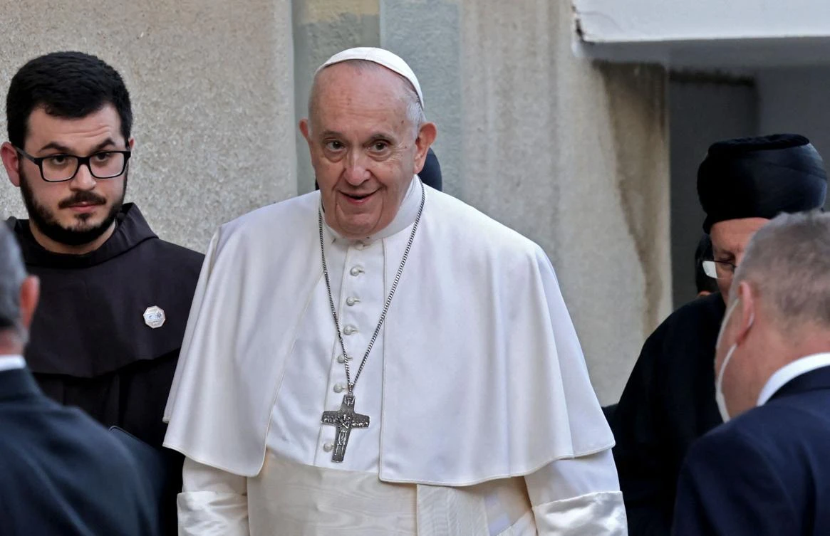 Pope Francis arrives at the Maronite Cathedral of Our Lady of Grace in Old Nicosia on his first stop following his arrival in Cyprus on December 2, 2021. (AFP)