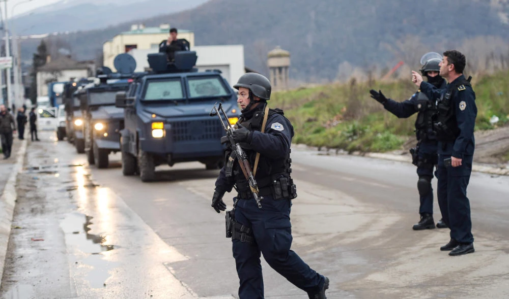 Members of the Kosovo police special unit secure in the town of Mitrovica. (AFP file photo)