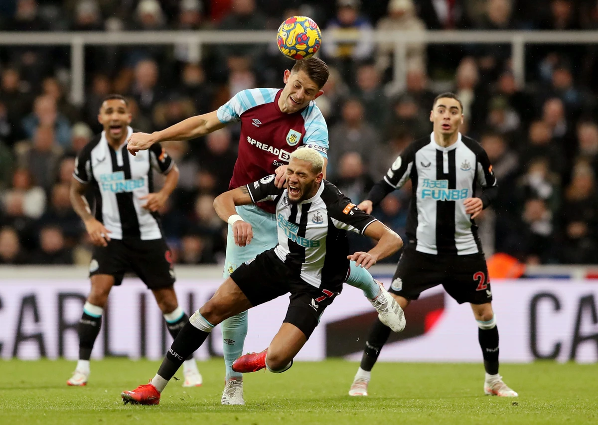 Burnley's James Tarkowski in action with Newcastle United's Joelinton during their Premier League clash at St James' Park on Saturday. (Reuters)