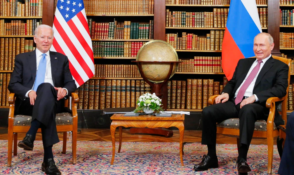 US President Joe Biden (L) meets with Russian President Valdimir Putin at the 'Villa la Grange' in Geneva on June 16, 2021. (AFP)